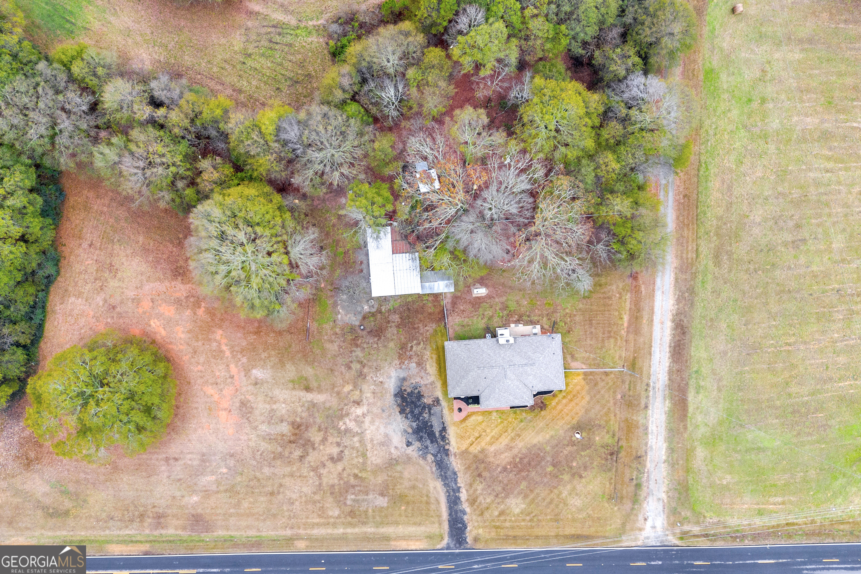 975 Diamond Hill Neese Road Colbert, GA 30628 - Photo 42 of 59 an aerial view of residential house with outdoor space