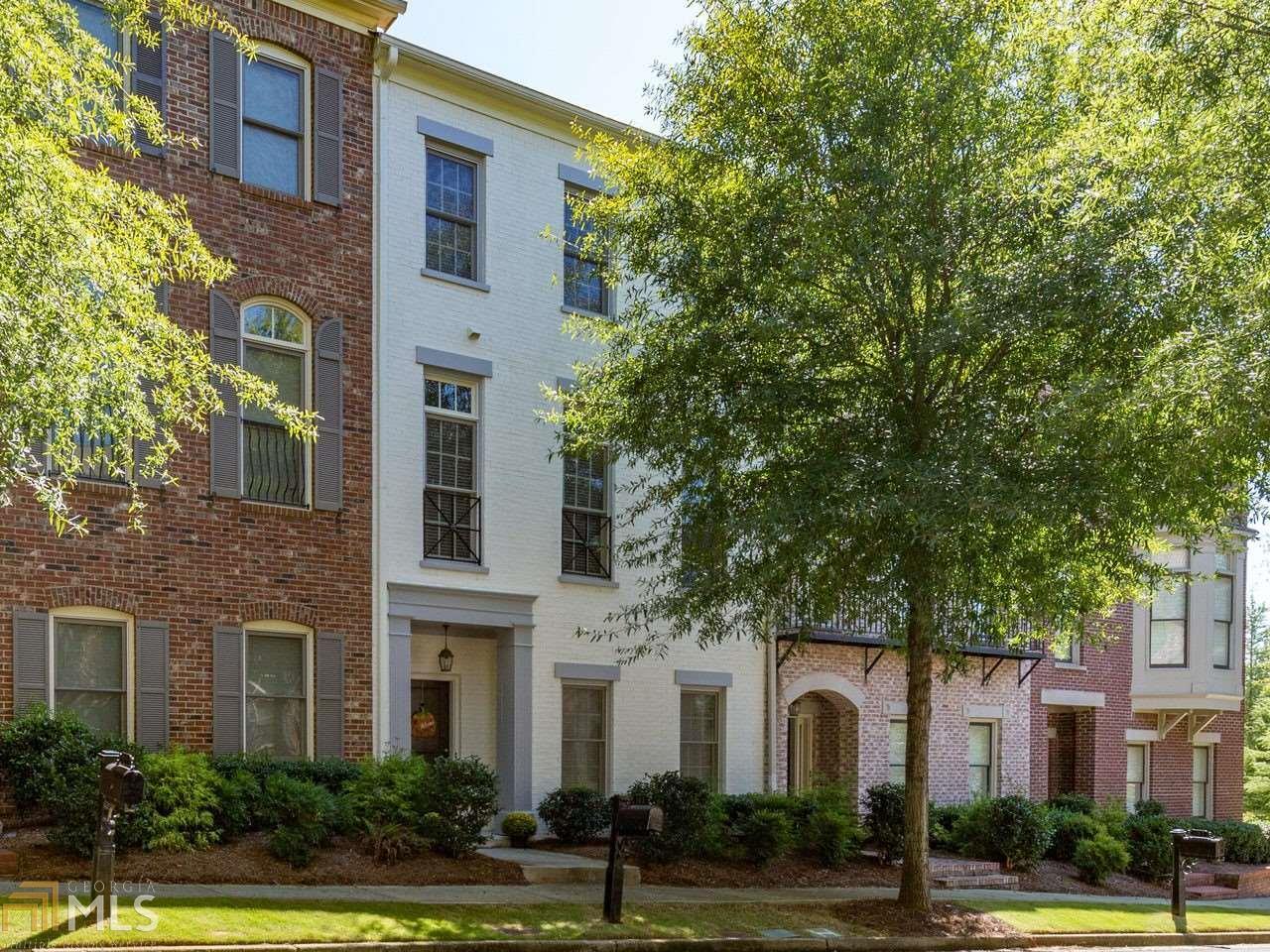 108 West Ridge Way Roswell, GA 30076 - Photo 1 of 1 a view of a white house with a outdoor space