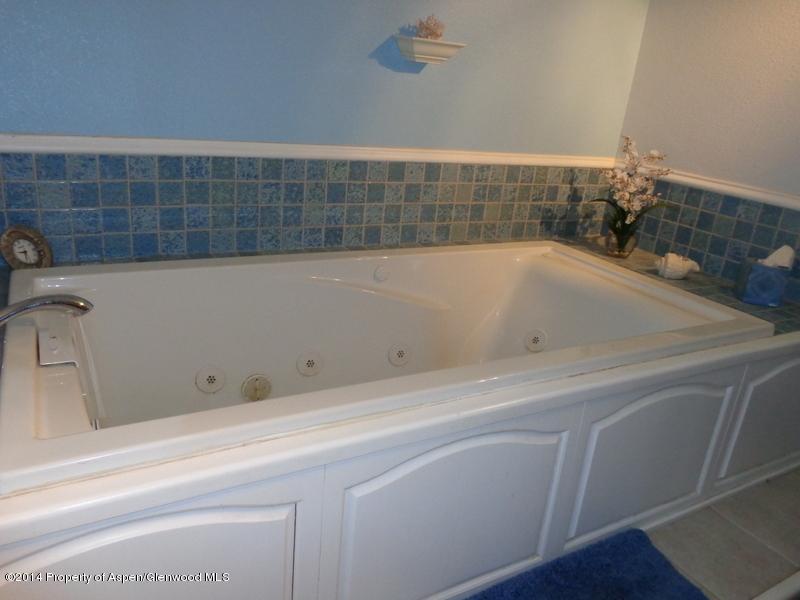 416 East 11th Street Rifle, CO 81650 - Photo 23 of 44 a bathroom with a bathtub
