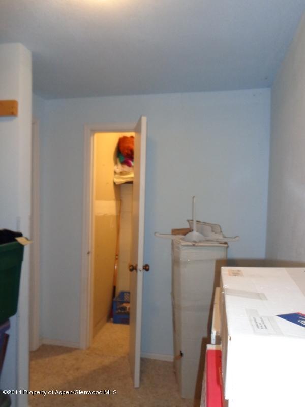 416 East 11th Street Rifle, CO 81650 - Photo 26 of 44 a storage room with a washer and dryer