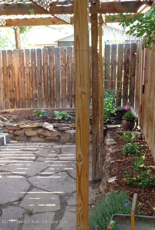 416 East 11th Street Rifle, CO 81650 - Photo 40 of 44 a view of a backyard with the plants