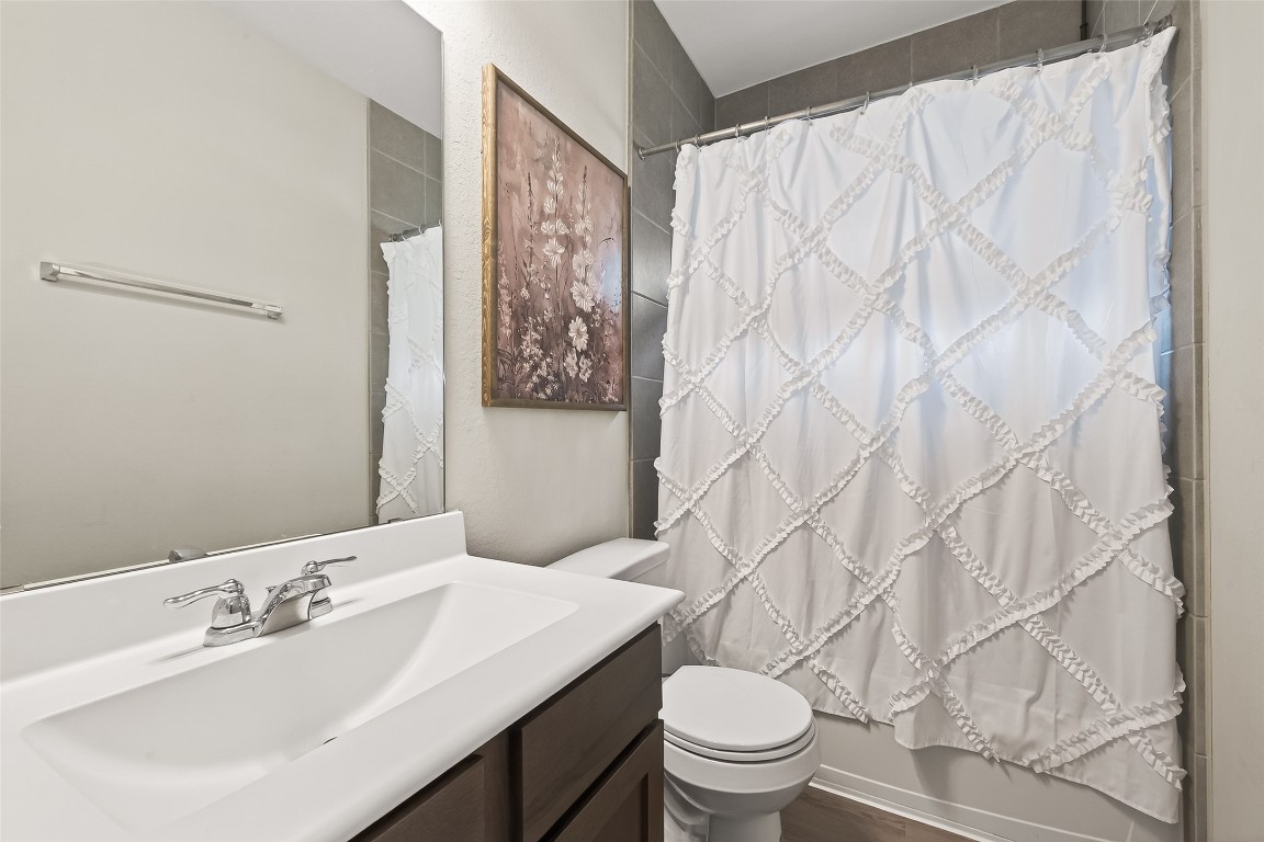 6027 Prince Place Drive Rosenberg, TX 77471 - Photo 28 of 39 This full bathroom offers a solid vanity and a classic shower-tub combination with lovely tile work that’s easy to keep looking fresh.