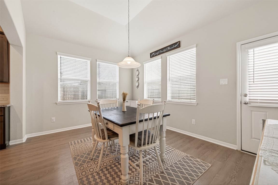 6027 Prince Place Drive Rosenberg, TX 77471 - Photo 9 of 39 This dining area sits right by the backyard door, making it easy to transition from a quick breakfast to an afternoon on the patio.