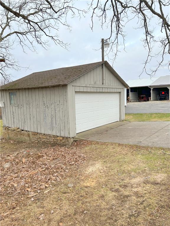 2503 Nashua Road New Castle, PA 16105 - Photo 6 of 10 a front view of a house with a yard and garage