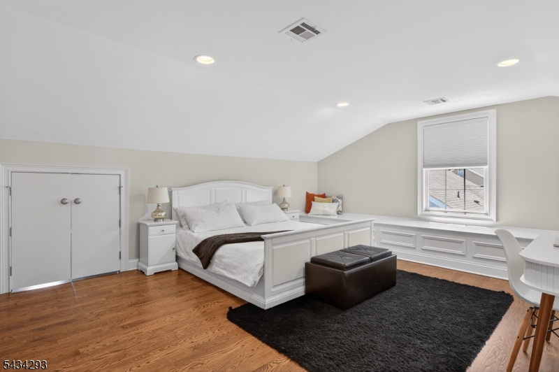 921 Harding Street Westfield, NJ 07090 - Photo 36 of 50 a bedroom with a bed and a couch