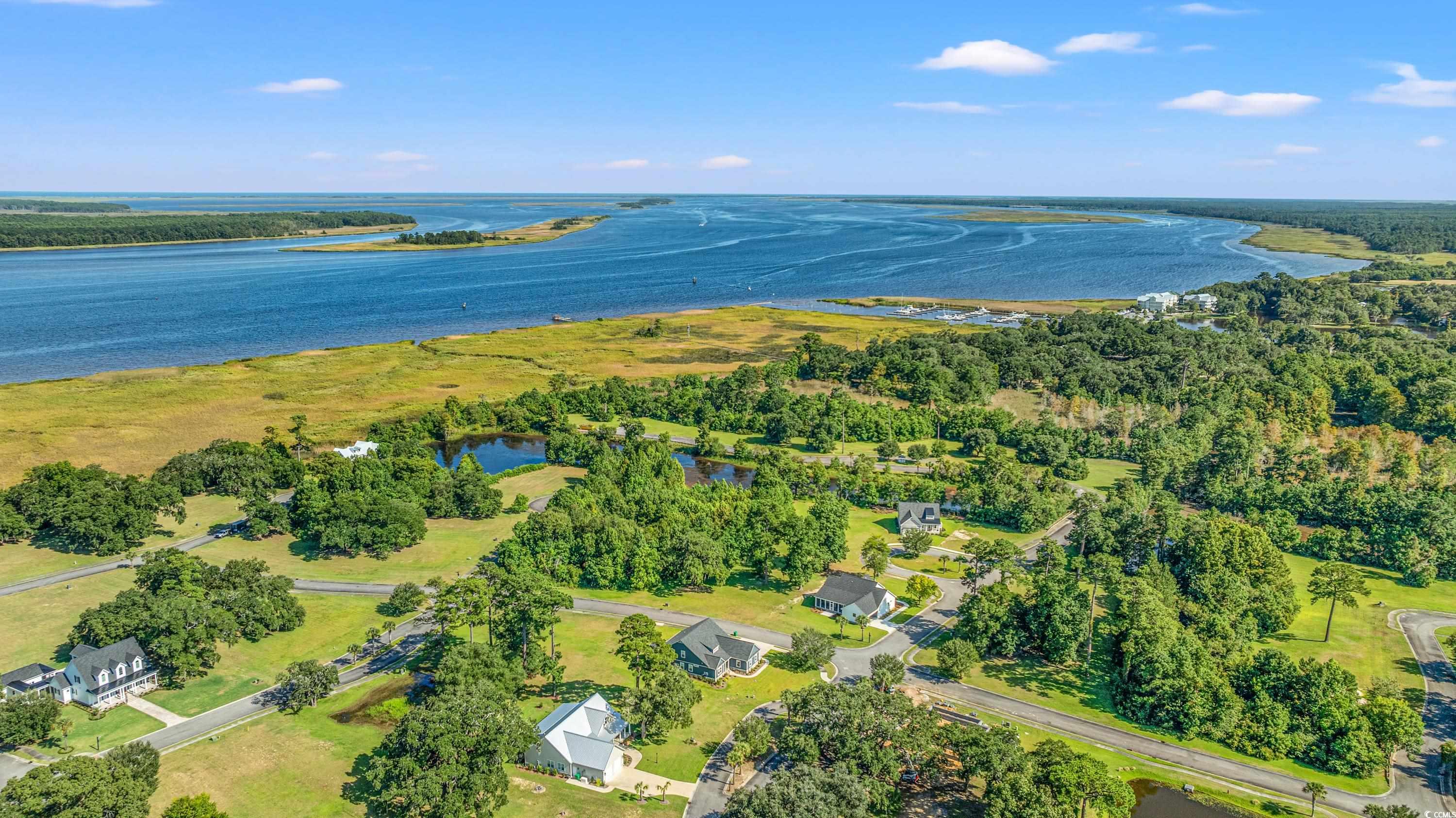 3673 South Island Road Georgetown, SC 29440 - Photo 22 of 26 Birds eye view of property featuring a water view