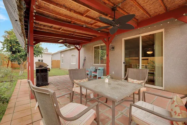 a view of a porch with furniture