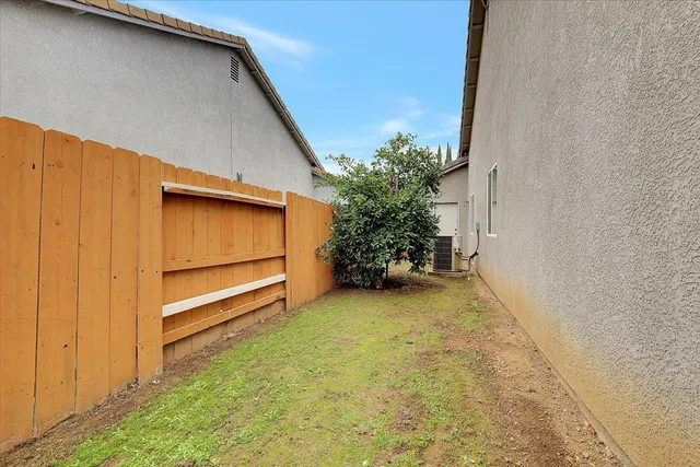 a view of a garage with parked cars