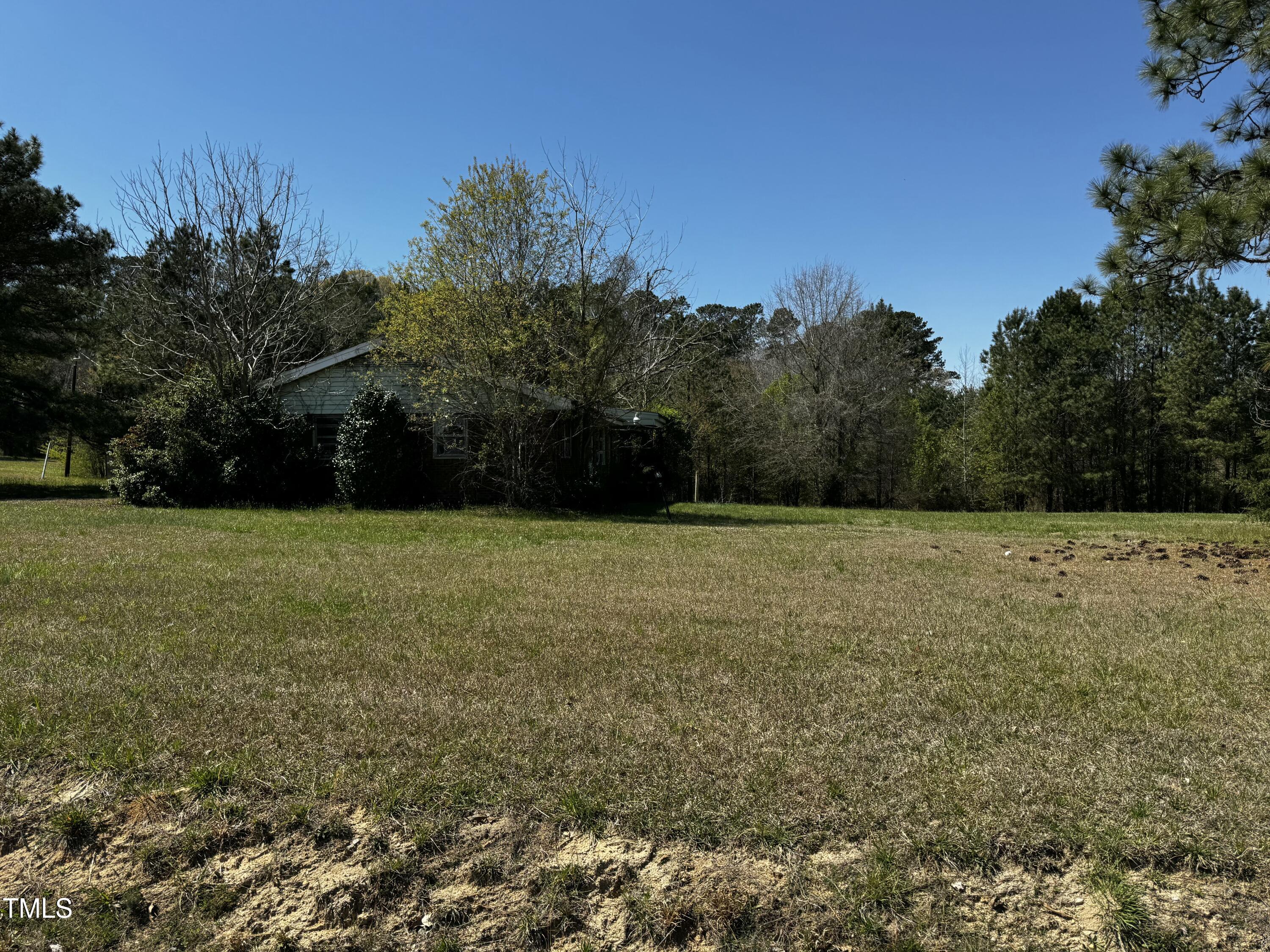 0 Battle Bridge Road Raleigh, NC 27610 - Photo 2 of 4 a view of outdoor space with deck and yard