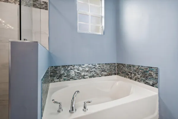 a bathroom with a bathtub