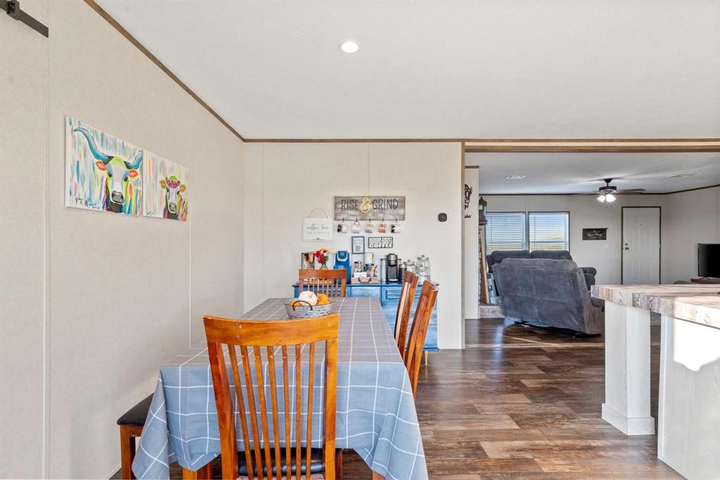 10026 County Rd NW 4350 Frost, TX 76641 - Photo 13 of 33 a living room with furniture and a wooden floor