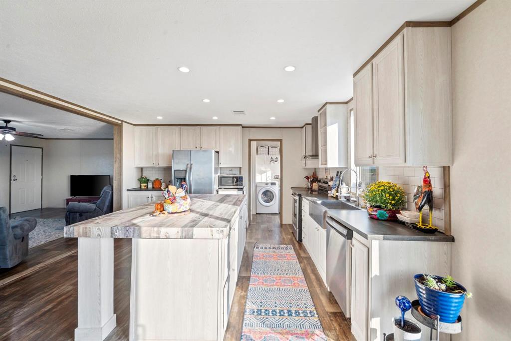 10026 County Rd NW 4350 Frost, TX 76641 - Photo 10 of 33 a kitchen with a sink and appliances