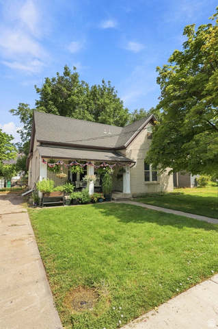 154 West 400 North Springville, UT 84663 - Photo 8 of 43 Brick exterior with an asphalt shingle roof