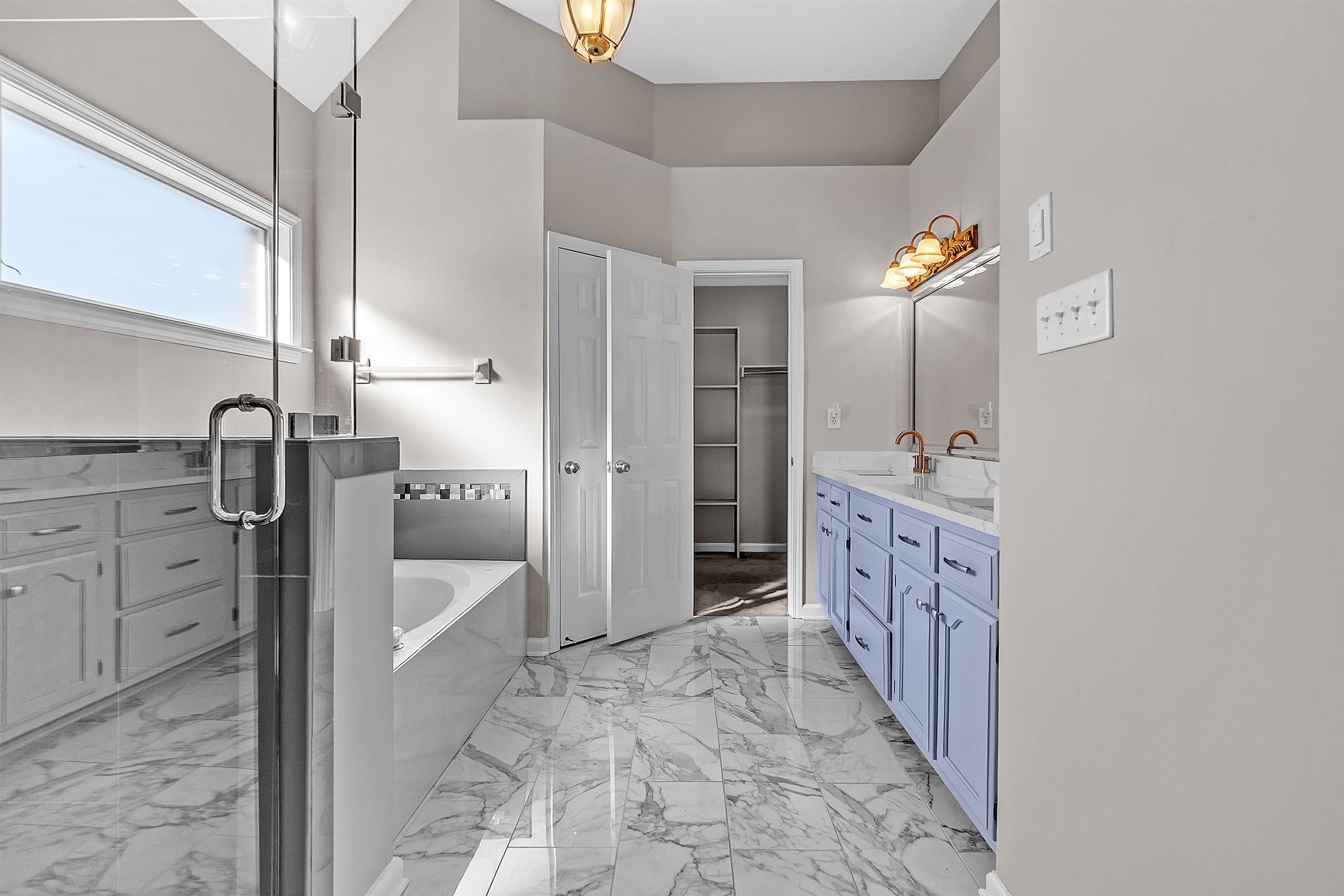 6700 Beagle Lane Bartlett, TN 38002 - Photo 23 of 40 a bathroom with a sink and a mirror