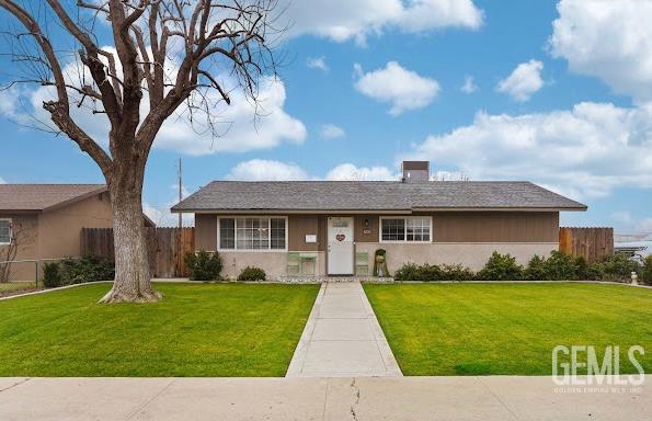Undisclosed Address Shafter, CA 93263 - Photo 1 of 21 a front view of a house with a yard