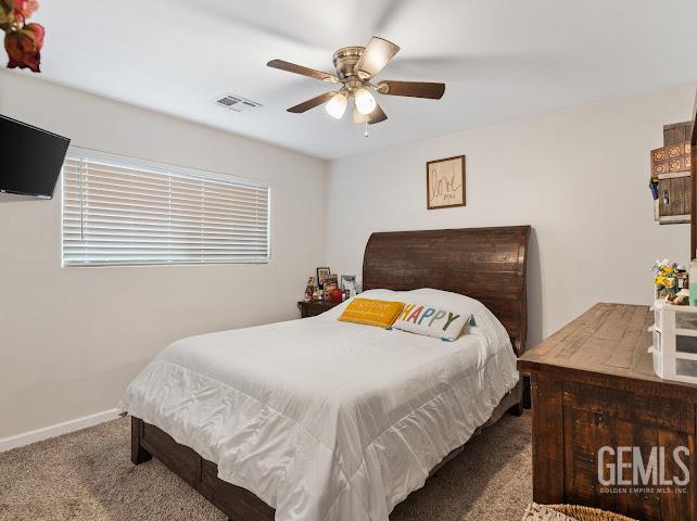Undisclosed Address Shafter, CA 93263 - Photo 13 of 21 a bedroom with bed and a window