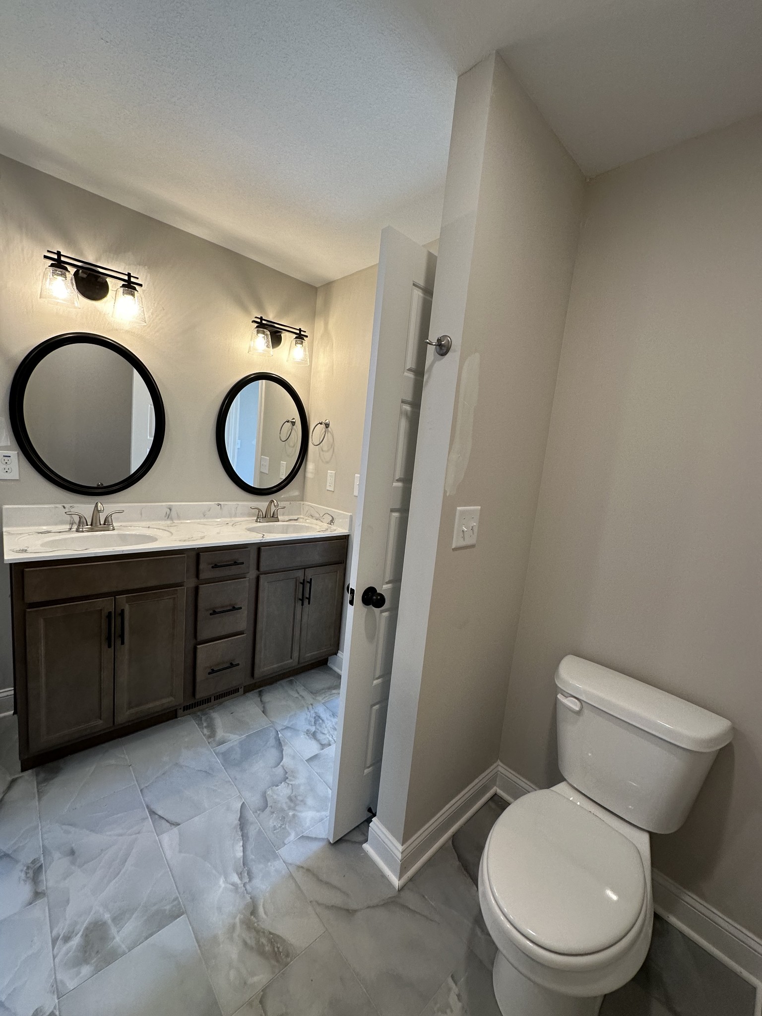 104 Cherry Fields Clarksville, TN 37042 - Photo 17 of 18 a bathroom with a toilet a sink and a mirror