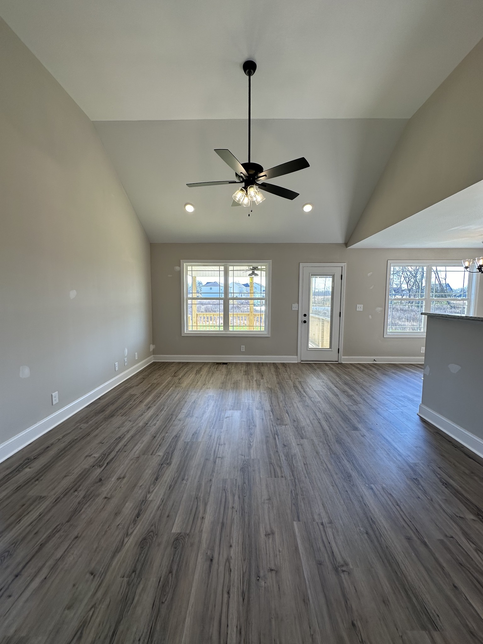 104 Cherry Fields Clarksville, TN 37042 - Photo 8 of 18 a view of an empty room with wooden floor and a window