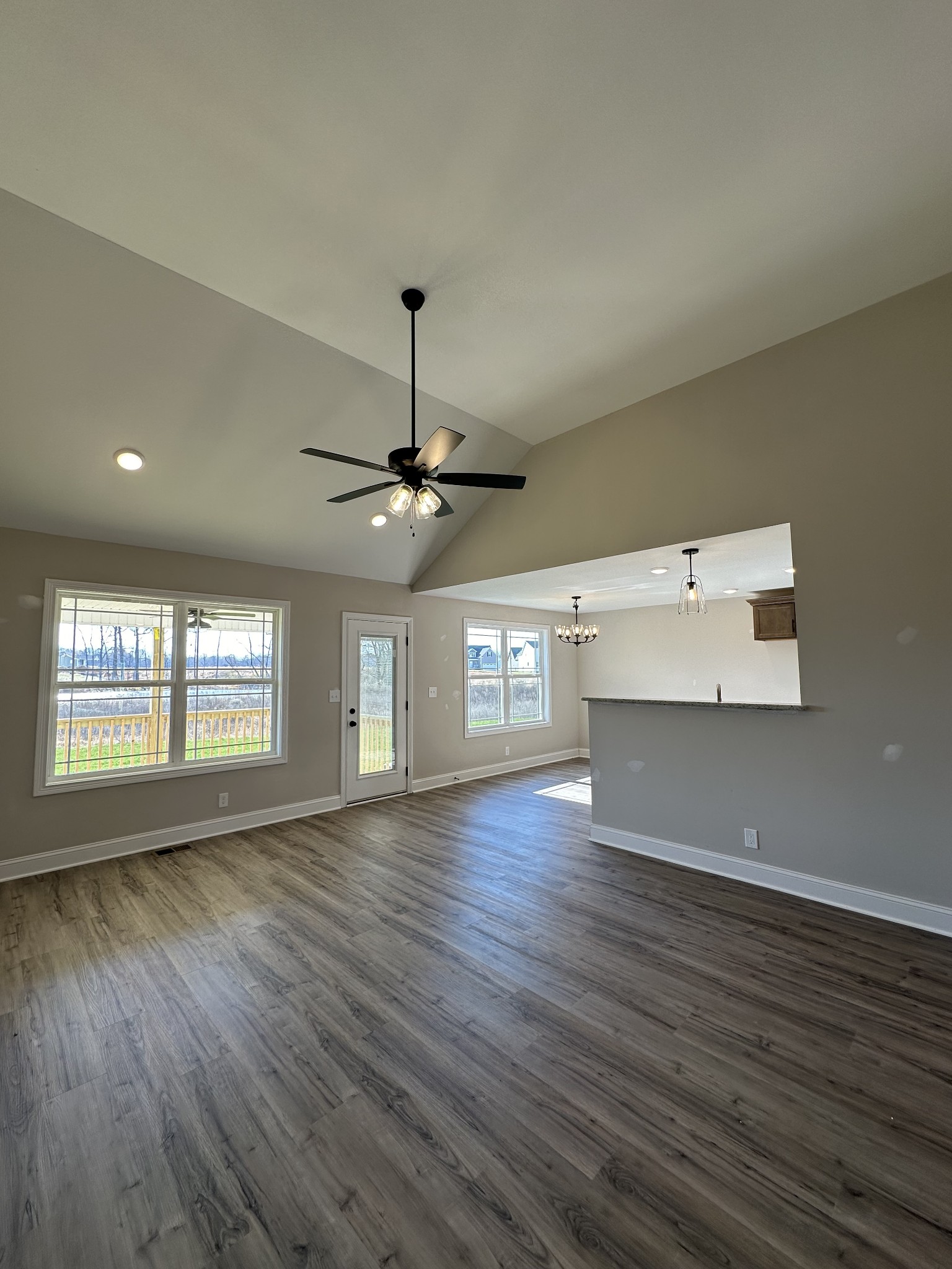 104 Cherry Fields Clarksville, TN 37042 - Photo 10 of 18 a view of an empty room with window and wooden floor