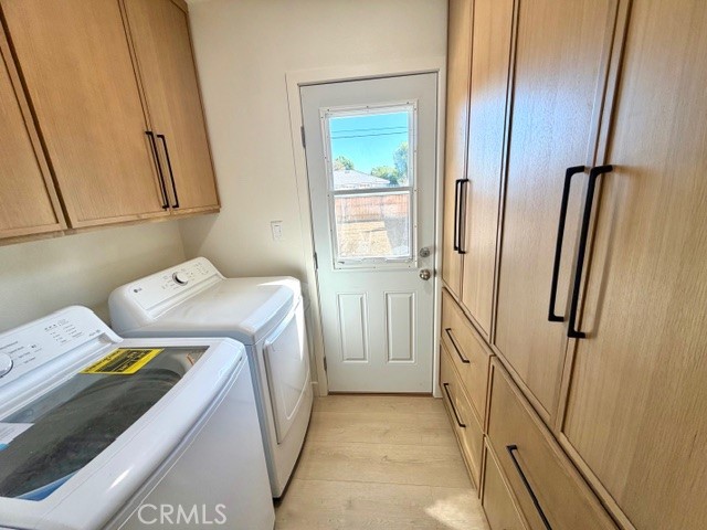 20754 Vose Street Winnetka, CA 91306 - Photo 11 of 21 a bedroom with a bed and a mirror