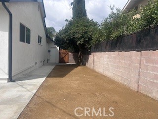 20754 Vose Street Winnetka, CA 91306 - Photo 25 of 32 a view of backyard with green space