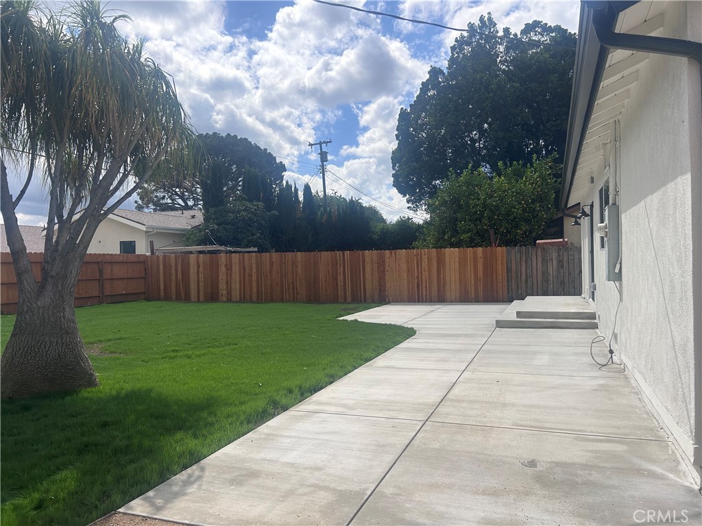 20754 Vose Street Winnetka, CA 91306 - Photo 29 of 32 a view of backyard with green space
