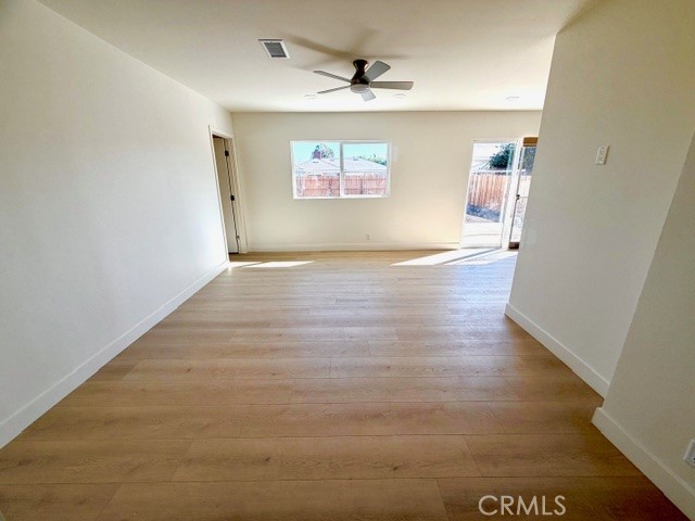 20754 Vose Street Winnetka, CA 91306 - Photo 7 of 32 wooden floor in an empty room