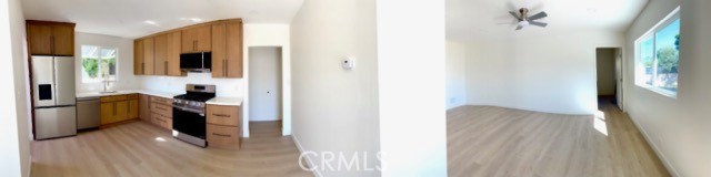 20754 Vose Street Winnetka, CA 91306 - Photo 8 of 21 a view of a kitchen from the hallway