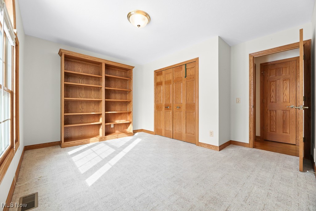 4808 Sherman Road Kent, OH 44240 - Photo 21 of 50 Unfurnished bedroom featuring light colored carpet and a closet