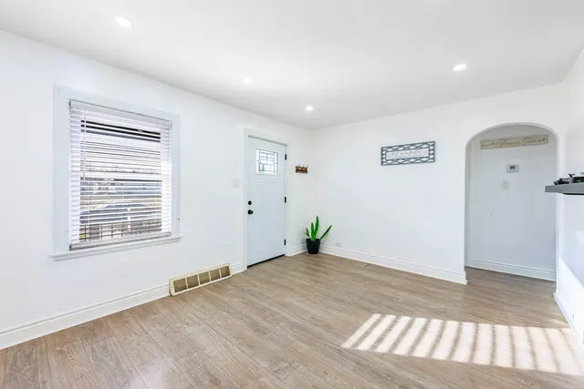 a room with furniture and window