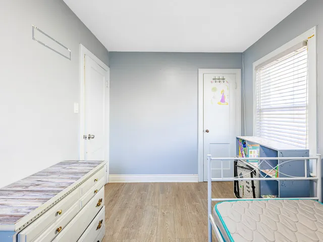 a livingroom with furniture and stairs