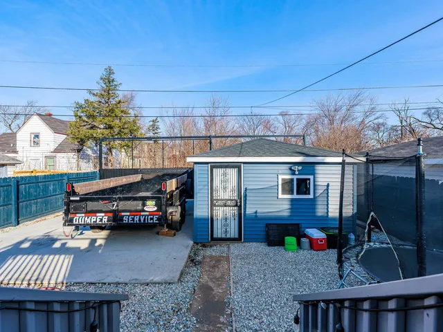a view of a chairs setting on the roof deck