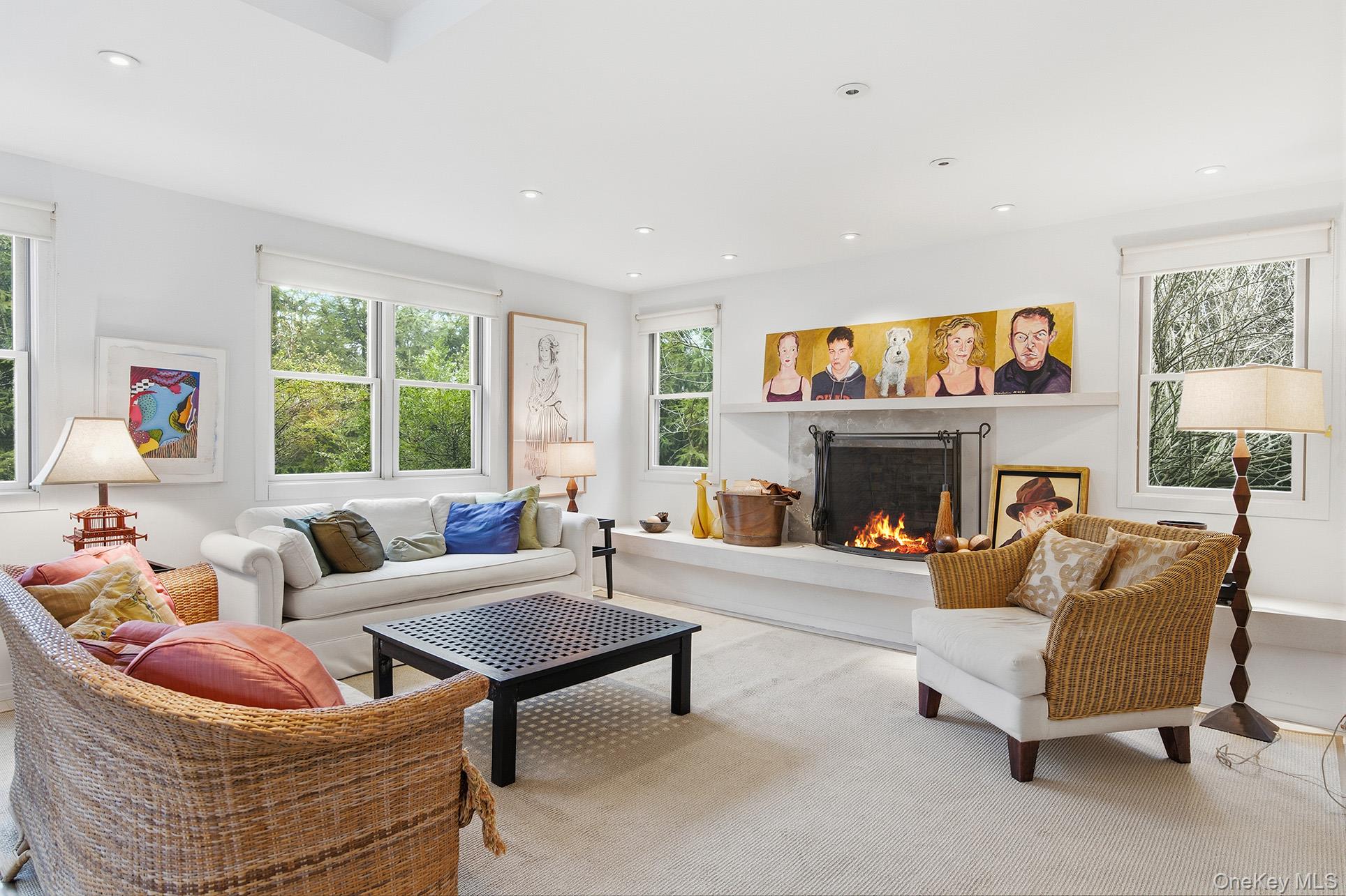 60 Skimhampton Road East Hampton, NY 11937 - Photo 5 of 37 a living room with furniture and a fireplace