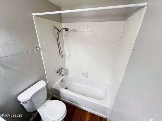 a bathroom with a sink vanity and a mirror