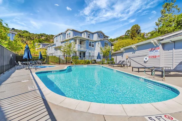 a view of a house with a swimming pool