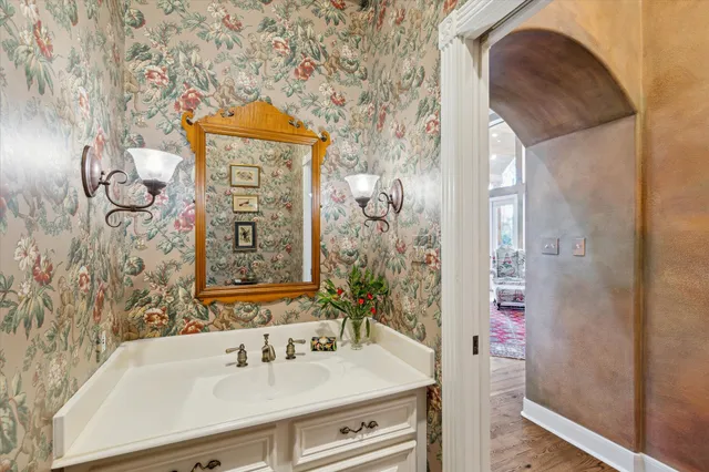 a bathroom with a sink and a mirror