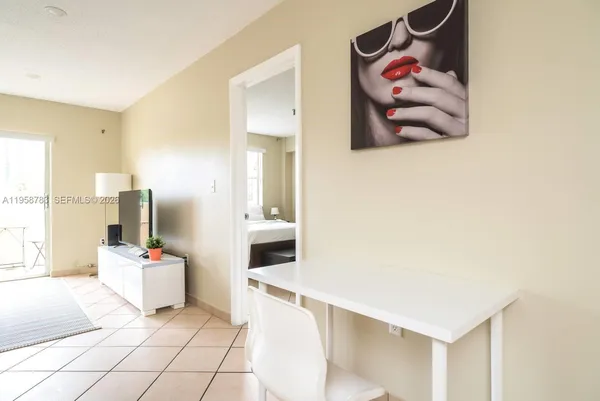 a bathroom with a sink and mirror