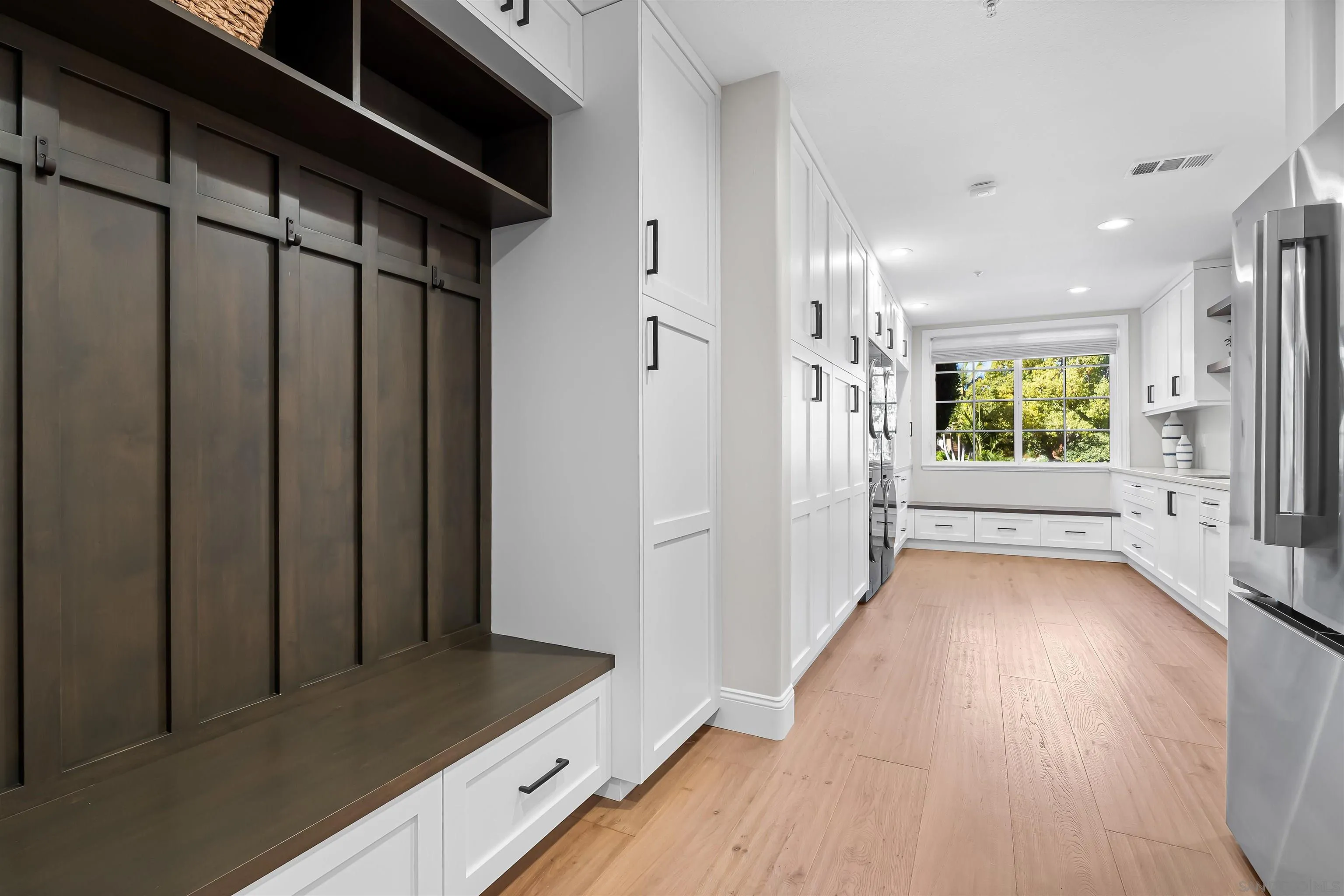 301 Cantle Lane Encinitas, CA 92024 - Photo 23 of 75 a view of hallway with wooden floor