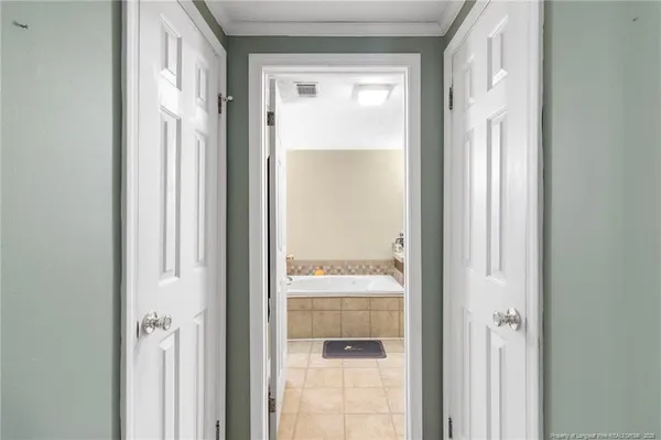 a view of a bathroom with a glass door