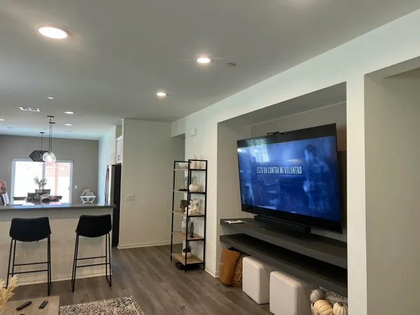a kitchen with stainless steel appliances a stove and cabinets