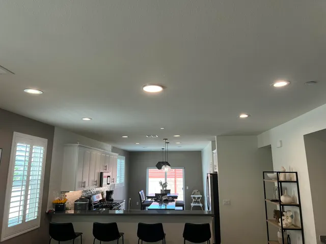 a large room with furniture and window