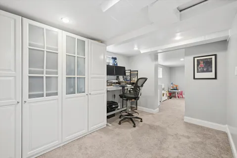 a view of a workspace with furniture