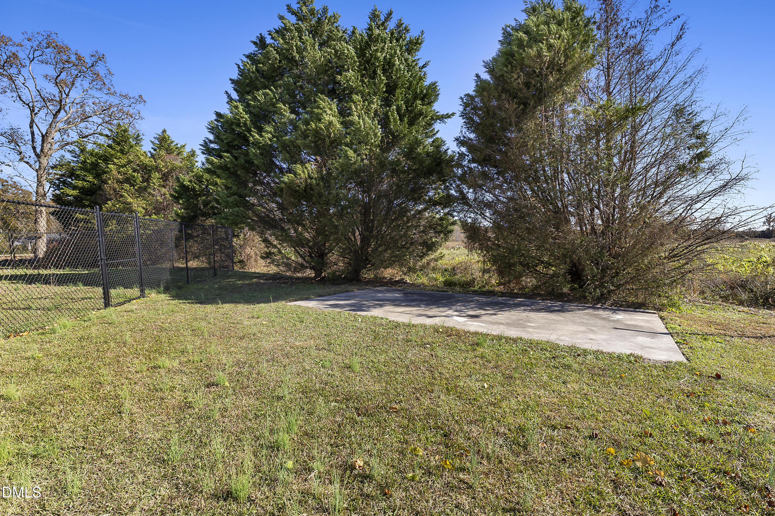 5575 Straw Pond School Road Godwin, NC 28344 - Photo 10 of 66 a view of a yard with large trees