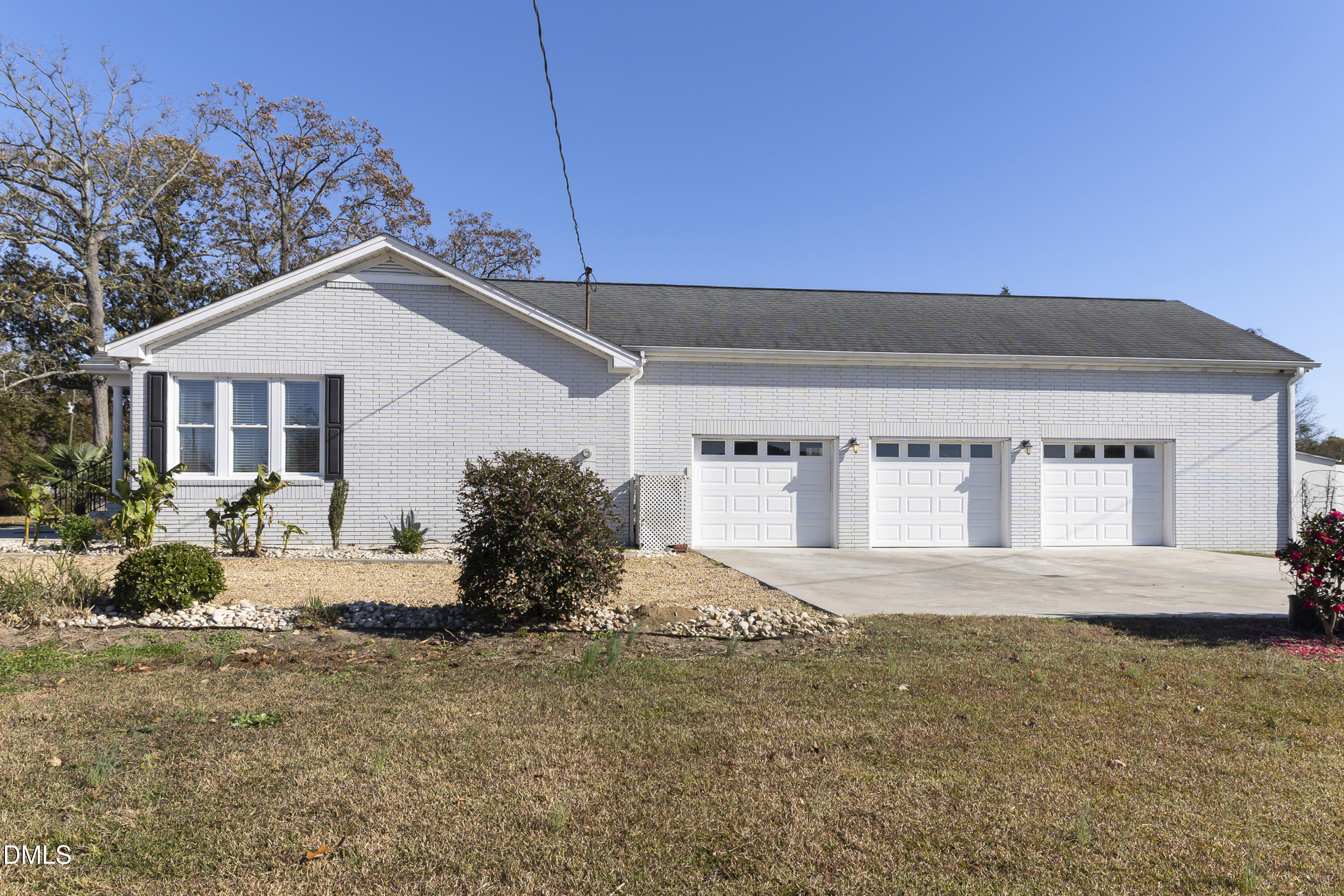 5575 Straw Pond School Road Godwin, NC 28344 - Photo 12 of 66 a front view of a house with a yard