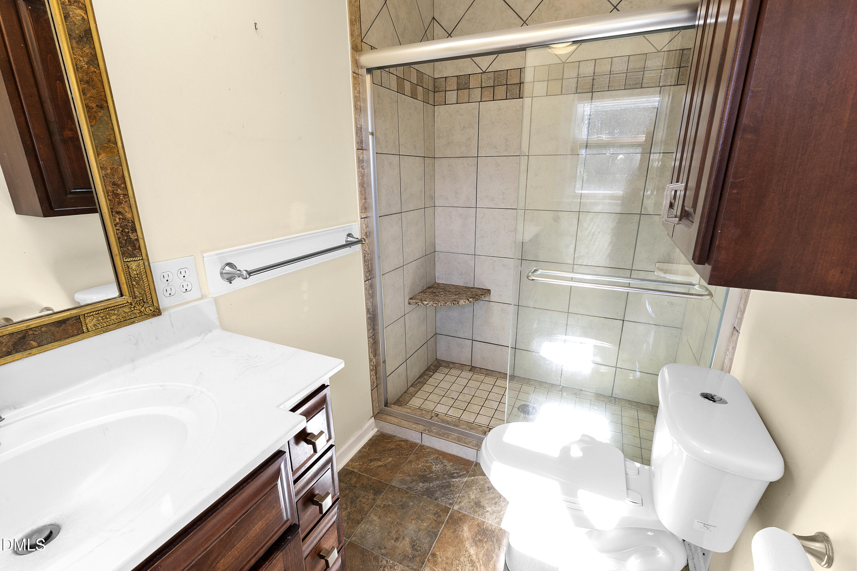 5575 Straw Pond School Road Godwin, NC 28344 - Photo 17 of 66 a bathroom with a sink and a shower