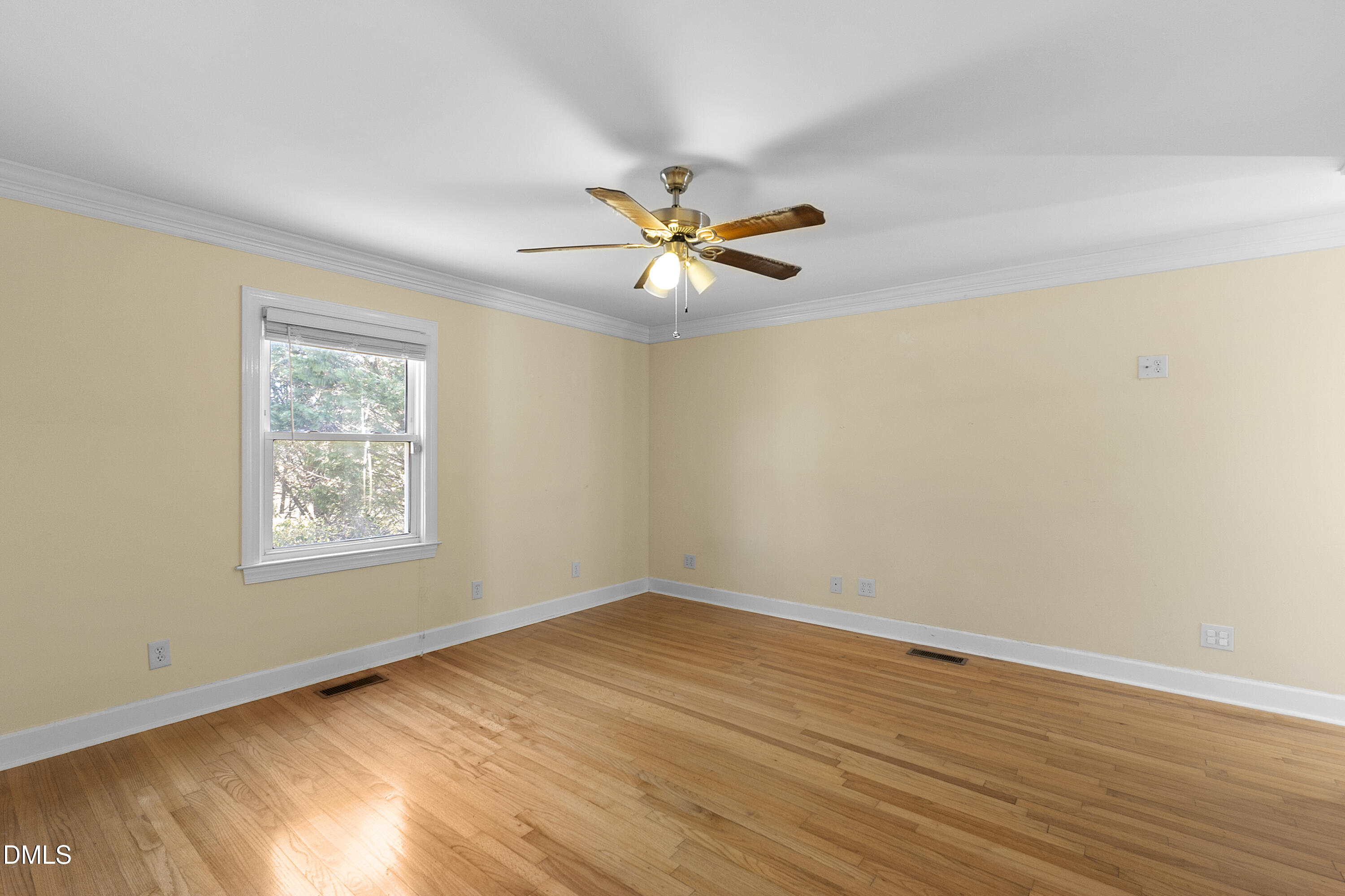 5575 Straw Pond School Road Godwin, NC 28344 - Photo 22 of 66 a view of an empty room with window and wooden floor