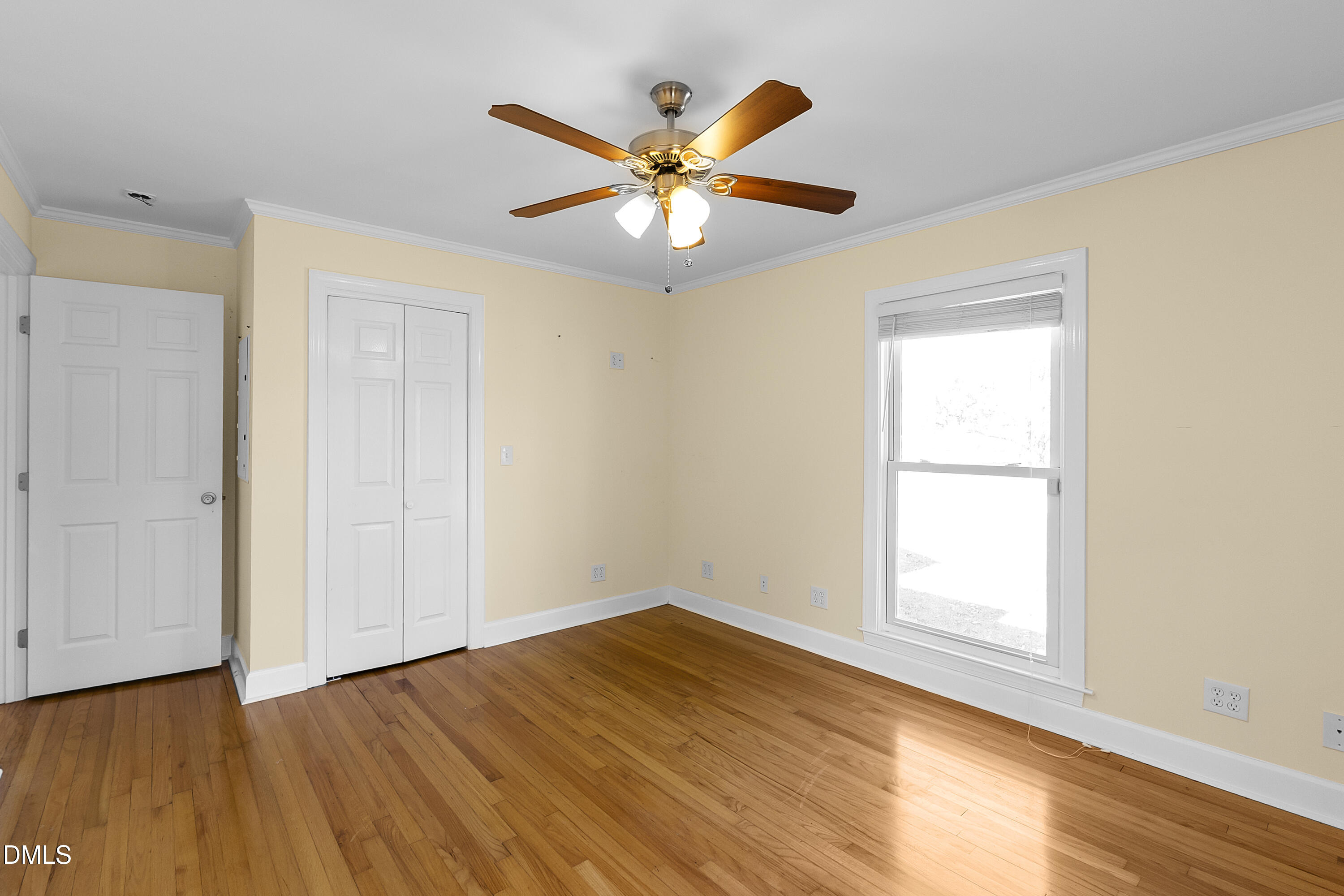 5575 Straw Pond School Road Godwin, NC 28344 - Photo 25 of 66 a view of an empty room with wooden floor and a window