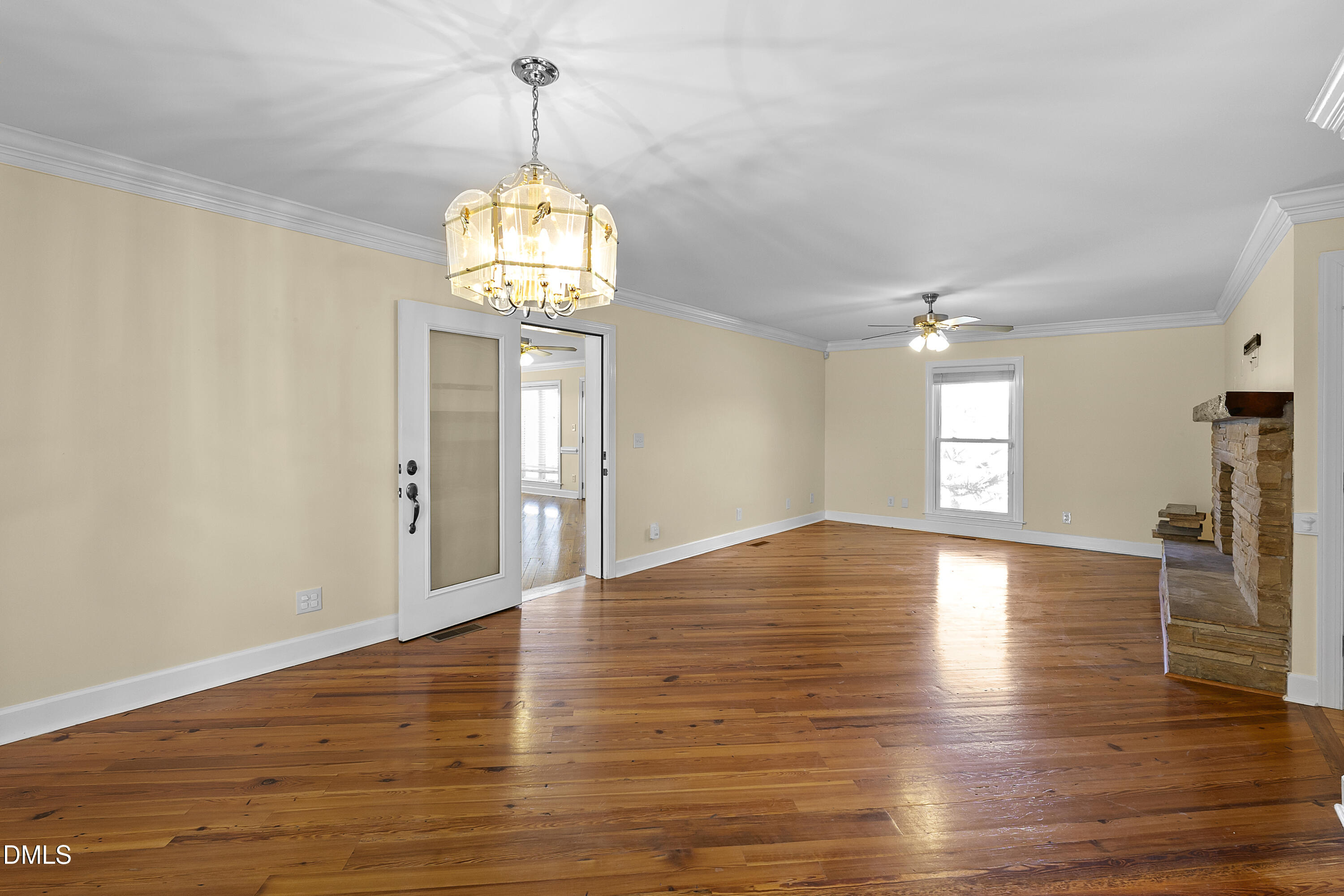 5575 Straw Pond School Road Godwin, NC 28344 - Photo 31 of 66 a view of empty room with wooden floor and window