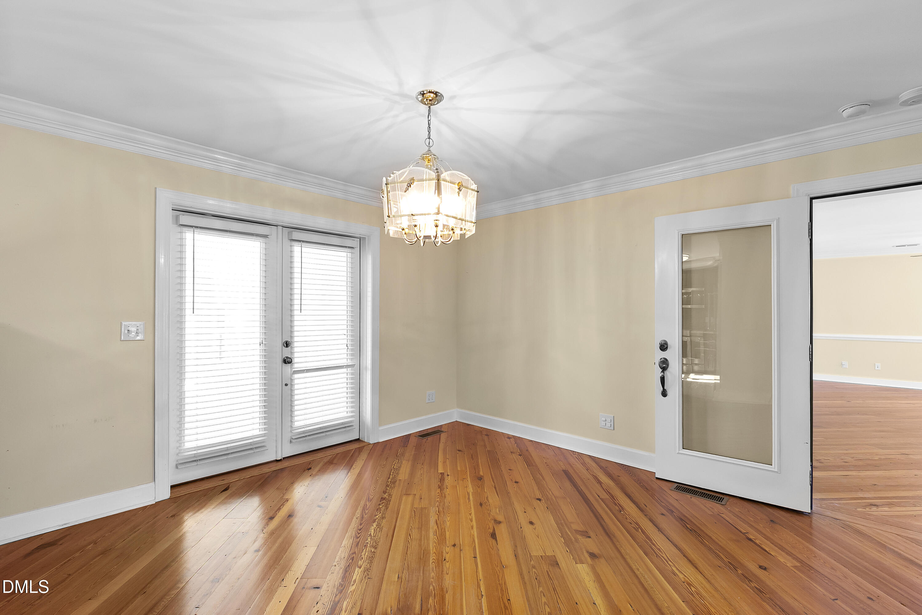 5575 Straw Pond School Road Godwin, NC 28344 - Photo 32 of 66 a view of empty room with wooden floor and window