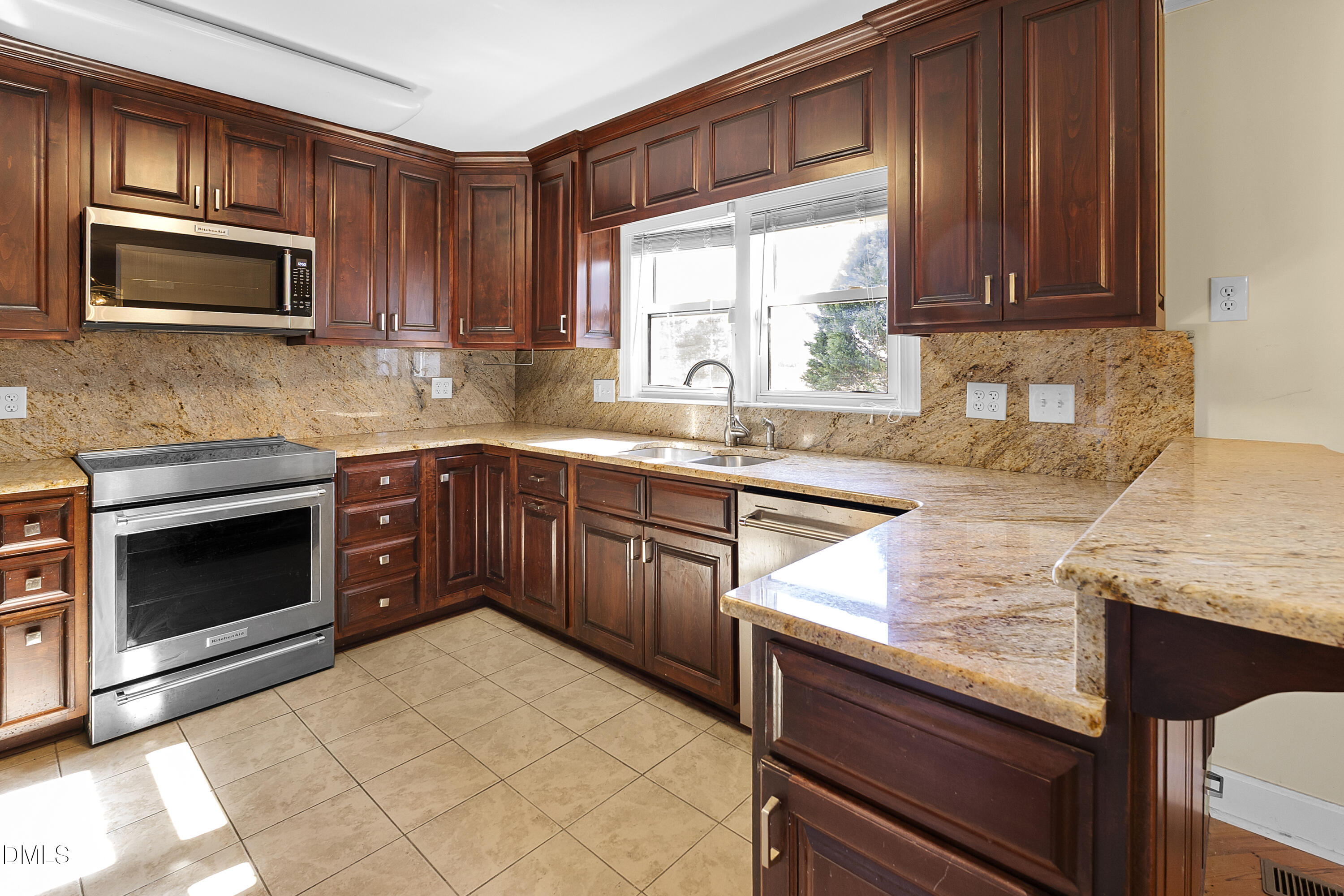 5575 Straw Pond School Road Godwin, NC 28344 - Photo 39 of 66 a kitchen with a sink stove and microwave